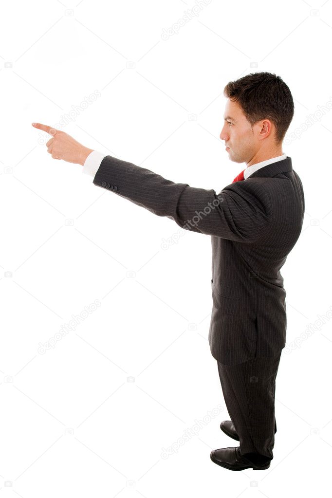 Successful young business man pointing at something interesting,