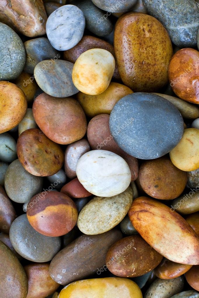 Abstract background with round peeble stones Stock Photo by ©cristovao  12926913