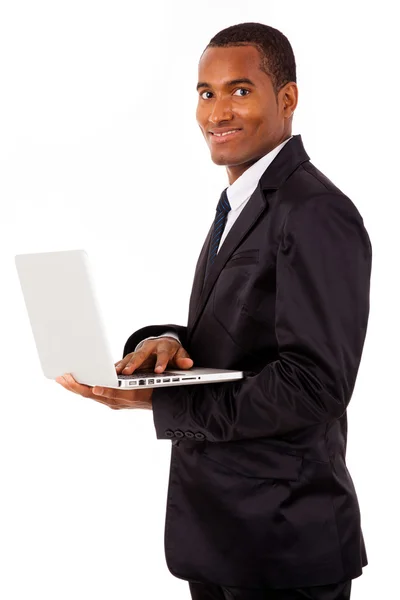 Homem de negócios africano feliz com laptop, isolado em branco — Fotografia de Stock