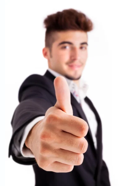 Sonriente joven hombre de negocios pulgares hacia arriba, aislado en blanco —  Fotos de Stock