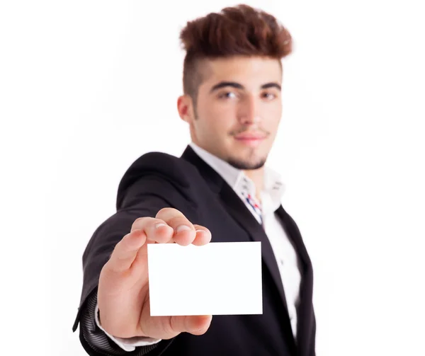 Business man in suit showing his business card on white backgrou — Stock Photo, Image