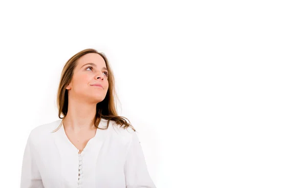 Belle femme réfléchie regardant vers le haut - isolé sur blanc — Photo