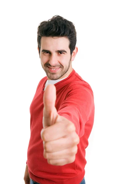 Pokazano szczęśliwy młody człowiek dorywczo kciuk i uśmiechnięty, na tle — Zdjęcie stockowe