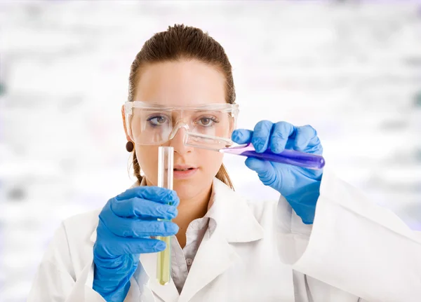 Young female scientist working at the laboratory Royalty Free Stock Images