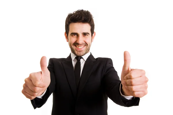 Genç iş adamı thumbs up gülümseyerek, üzerinde beyaz izole — Stok fotoğraf
