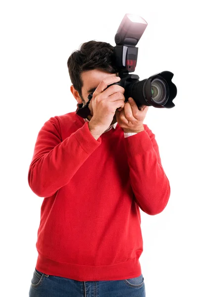 Beyaz zemin üzerinde kamera ile profesyonel fotoğrafçı — Stok fotoğraf
