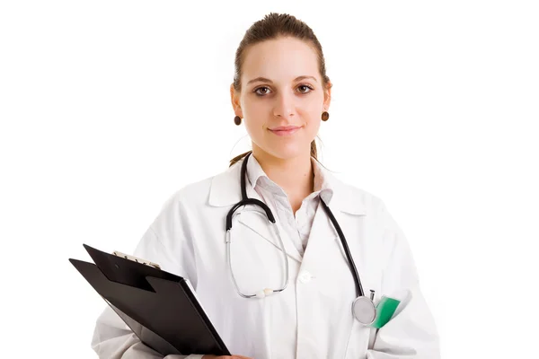 Female doctor holding a clipboard - isolated over a white backgr — Stock Photo, Image