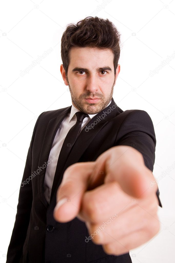 Young business man pointing at you isolated white background