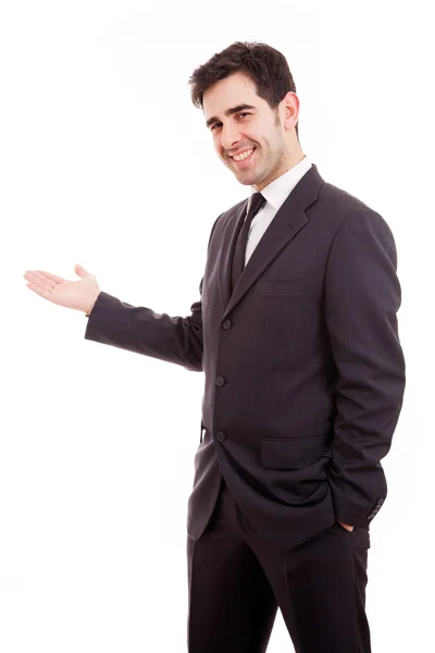 Successful young business man presenting over white background — Stock Photo, Image