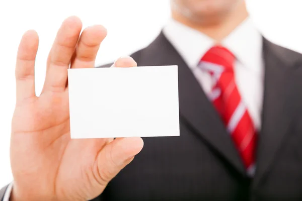 Hombre de negocios mostrando una tarjeta de visita en blanco sobre fondo blanco —  Fotos de Stock