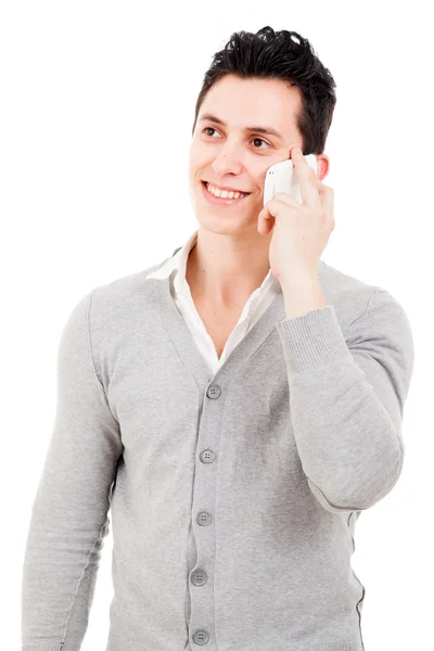 Smiling young casual man talking on the phone, isolated on white — Stock Photo, Image