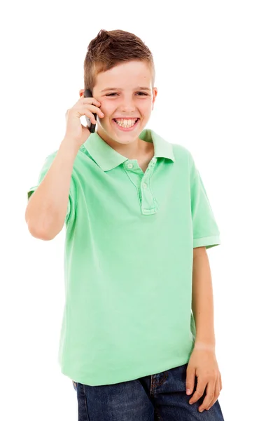 Boldog kisfiú beszél a telefonon, elszigetelt fehér backgro — Stock Fotó