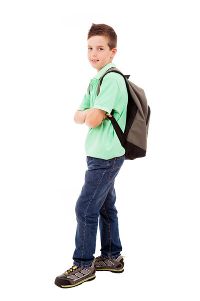 Full body portrait of a school boy with backpack, isolated on wh