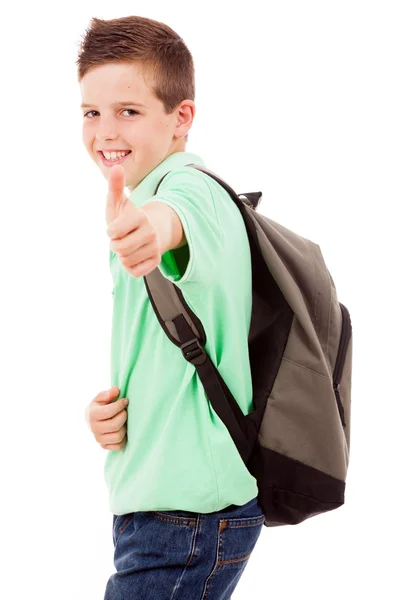 Χαρούμενος νεαρός σχολείο αγόρι δίνοντας τους αντίχειρες, να απομονώνονται σε λευκό backg — Φωτογραφία Αρχείου