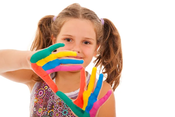 Schattig klein meisje met geschilderde handen. geïsoleerd op witte achtergrond. — Stockfoto