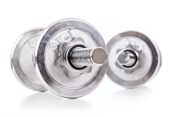 Chromed dumbbells weights over white background — Zdjęcie stockowe