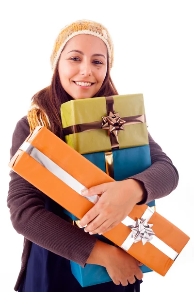 Beautiful young woman holding a gifts, isolated on white — Stock Photo, Image