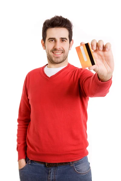 Glücklich lächelnder junger Mann zeigt Kreditkarte isoliert auf weißem Hintergrund — Stockfoto
