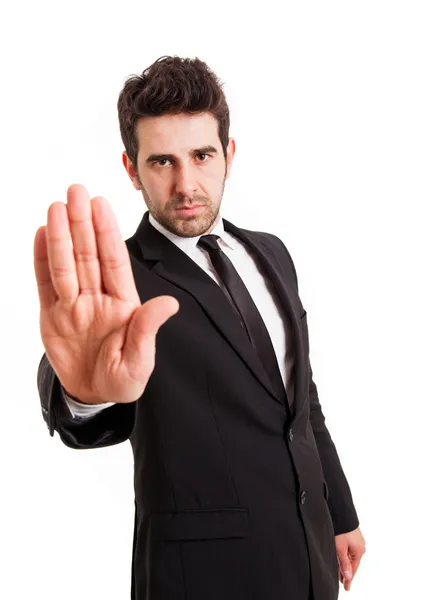 Businessman gestures STOP with his hand, isolated on white — Stock Photo, Image