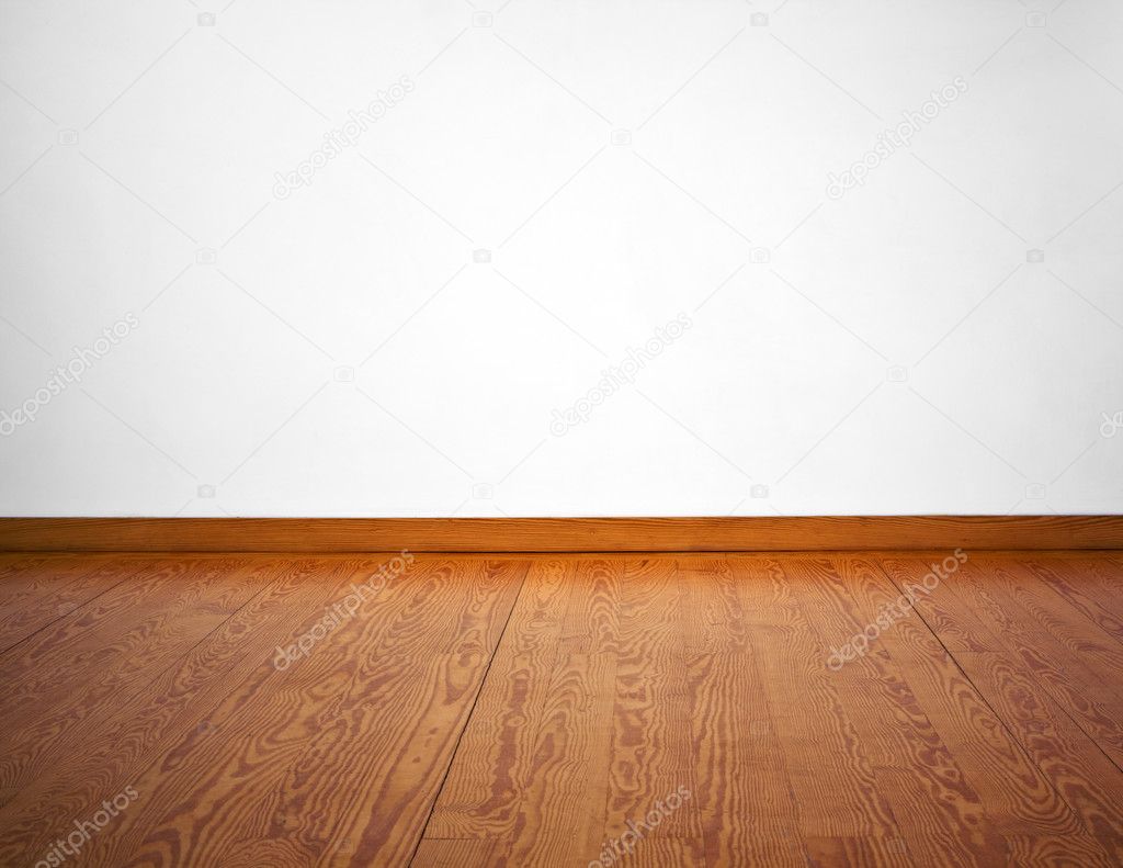 Empty white wall and wooden floor