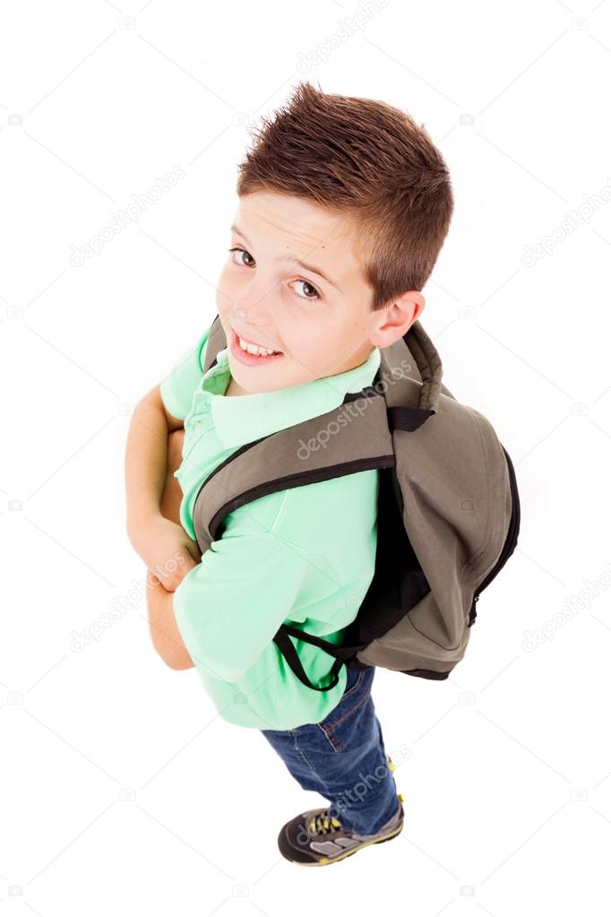Full body portrait of a school boy with backpack, isolated on wh