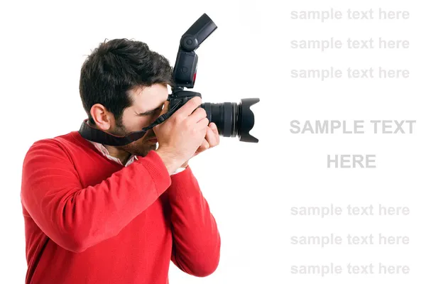 Professional photographer with camera on white background — Stock Photo, Image