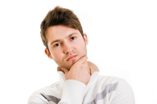 Un beau jeune homme pensant, isolé sur blanc — Photo