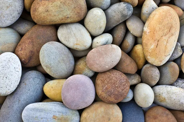 Fondo abstracto con piedras peeble redondas — Foto de Stock