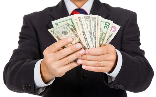 Business man holding dollar bills, isolated on white — Stock Photo, Image