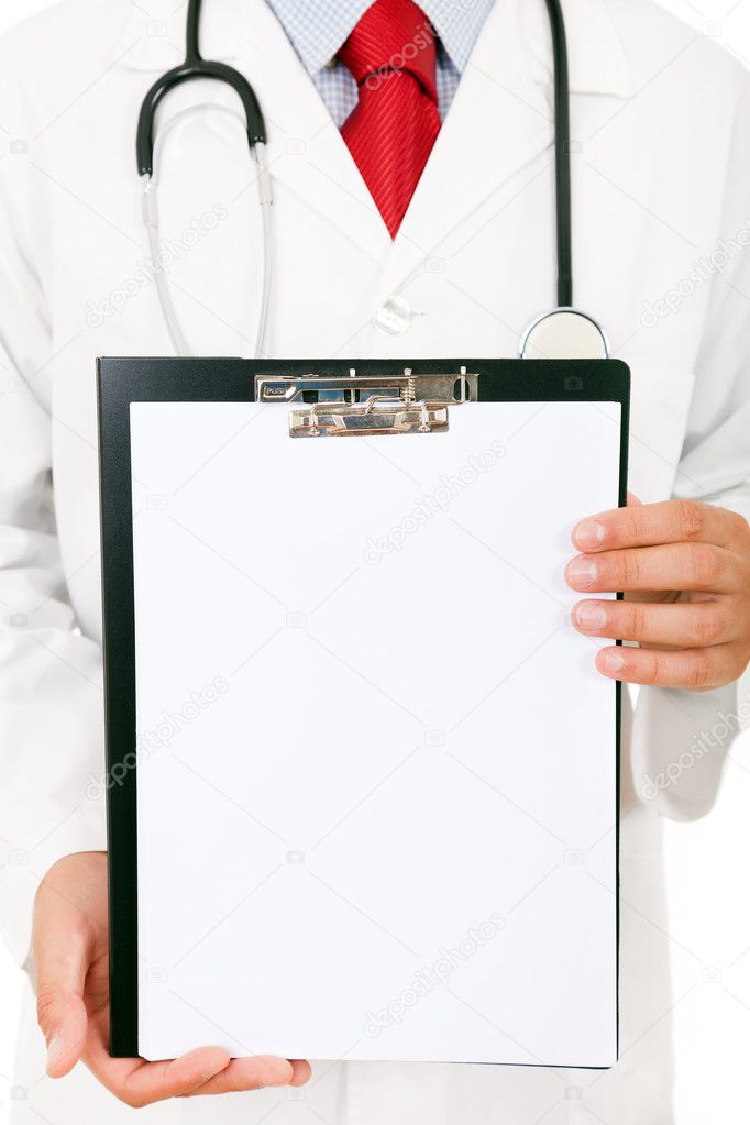 Doctor showing blank clipboard