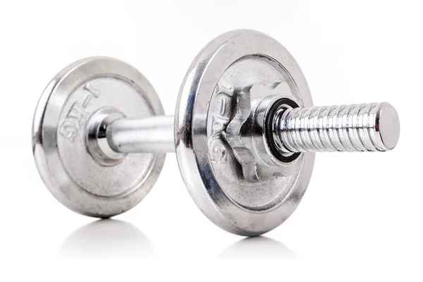 Chromed dumbbell weight over white background — Stock Photo, Image