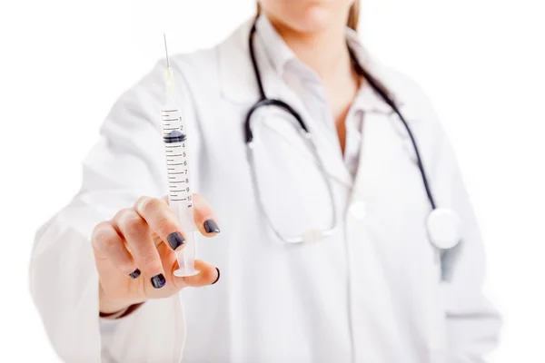 Medical doctor with syringe , focus on her hand, isolated on whi — Stock Photo, Image