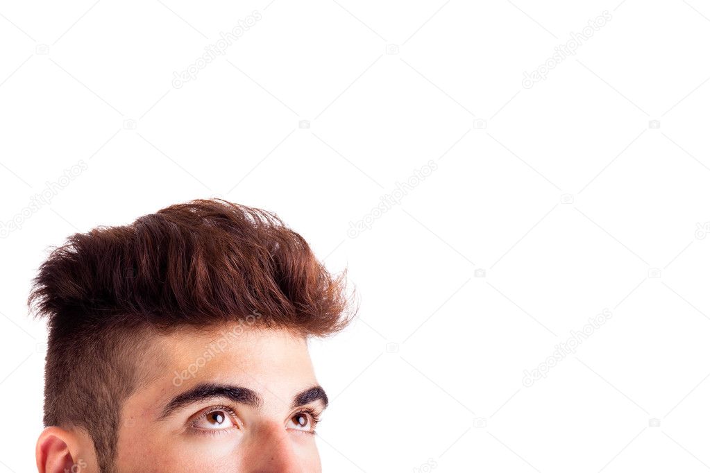 Close-up of young man looking up at copyspace