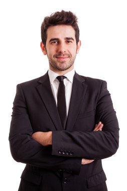 Beyaz arkasında izole bir gülümseyen genç iş adamı portresi