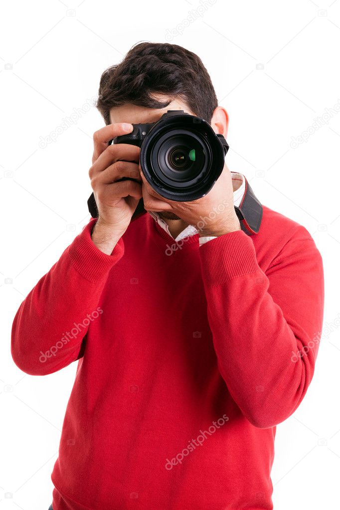 Young photographer with camera, isolated on white