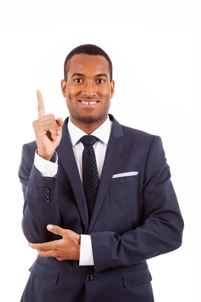 Portrait of happy African American businessman pointing at copy — Stock Photo, Image