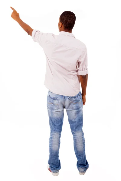 Młody dorywczy mężczyzna wskazując, odizolowany na białym — Zdjęcie stockowe