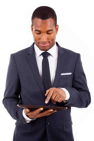 Thoughtful african american young businessman with tablet comput — Stock Photo, Image