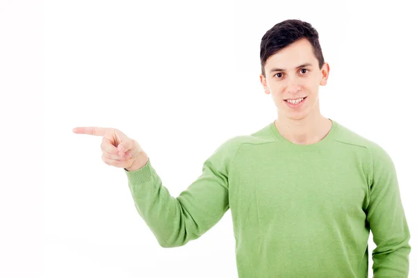 Jovem homem casual apontando para o espaço de cópia isolado em branco backgr — Fotografia de Stock