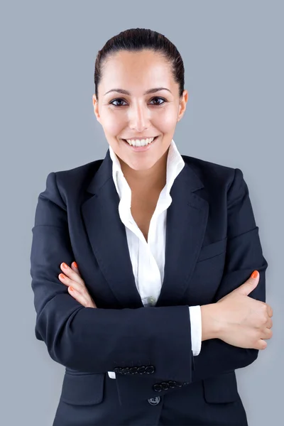 Portrait of a smiling beautiful young business woman standing ag — Stock Photo, Image