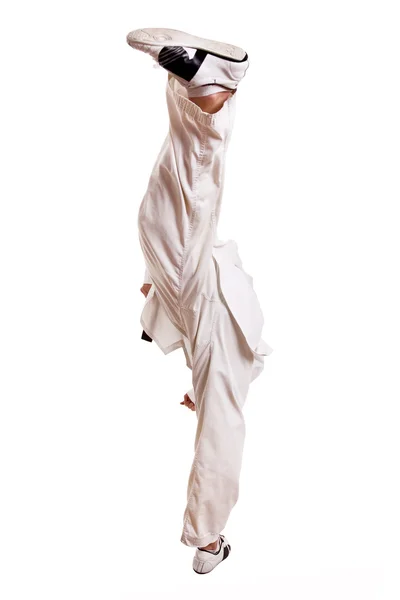 Man practicing martial arts making a kik, isolated over white ba — Stock Photo, Image