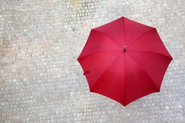 Red umbrella outdoors — Stock Photo, Image