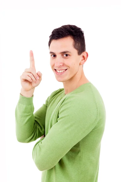 Retrato de un joven feliz apuntando hacia arriba sobre un fondo blanco Fotos de stock libres de derechos