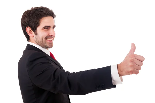 Smiling young business man with thumbs up gesture, isolated over — Stock Photo, Image