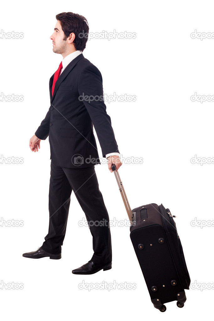 Young business man walking on white background with his travel b