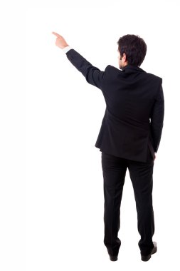 genç erkek işadamı boşaltmak üzerinde beyaz backgrou işaret eden.