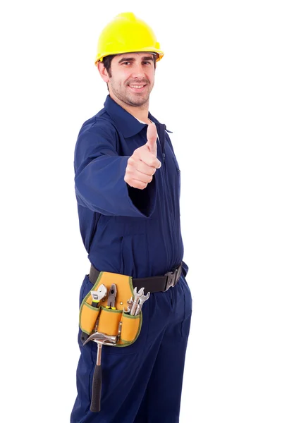Sorrindo jovem construtor polegares para cima no fundo branco — Fotografia de Stock