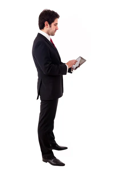 Young business man with tablet computer. Isolated over white bac Stock Photo