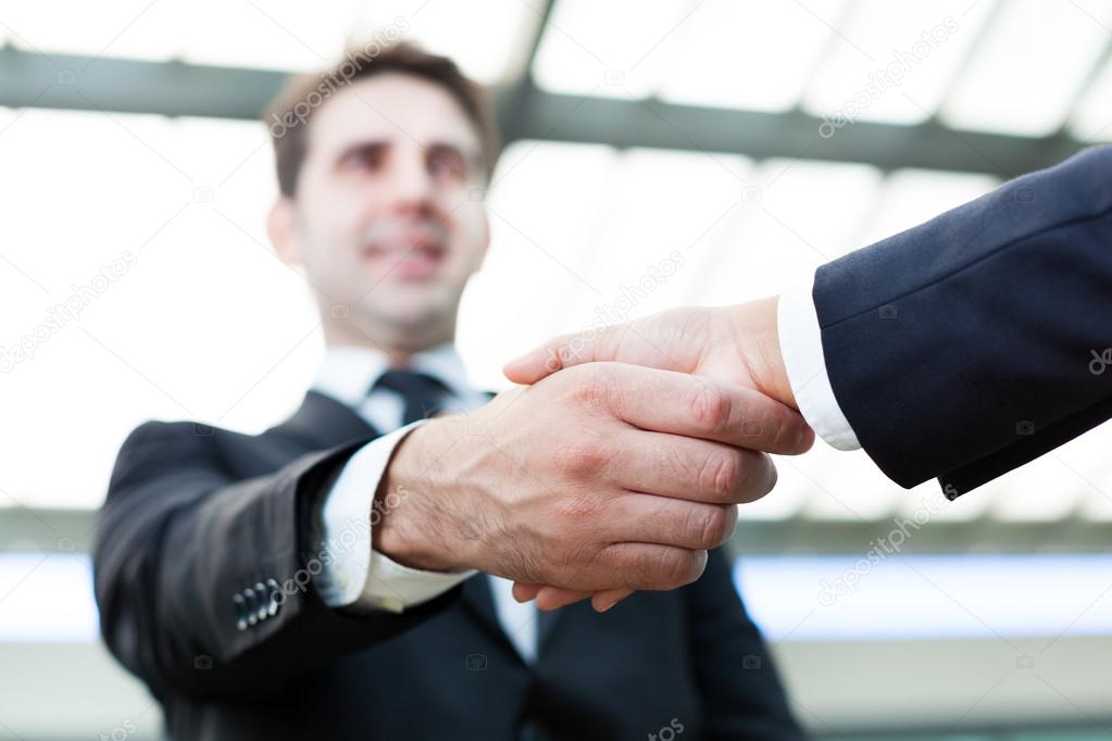 Image of business handshake at the office