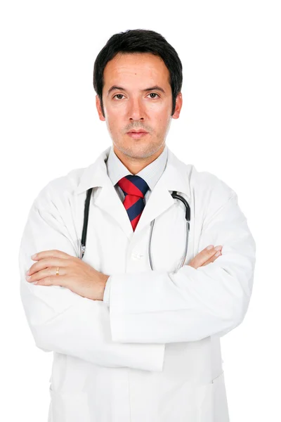 Lekarz stoi z stetoskop na białym tle — Zdjęcie stockowe